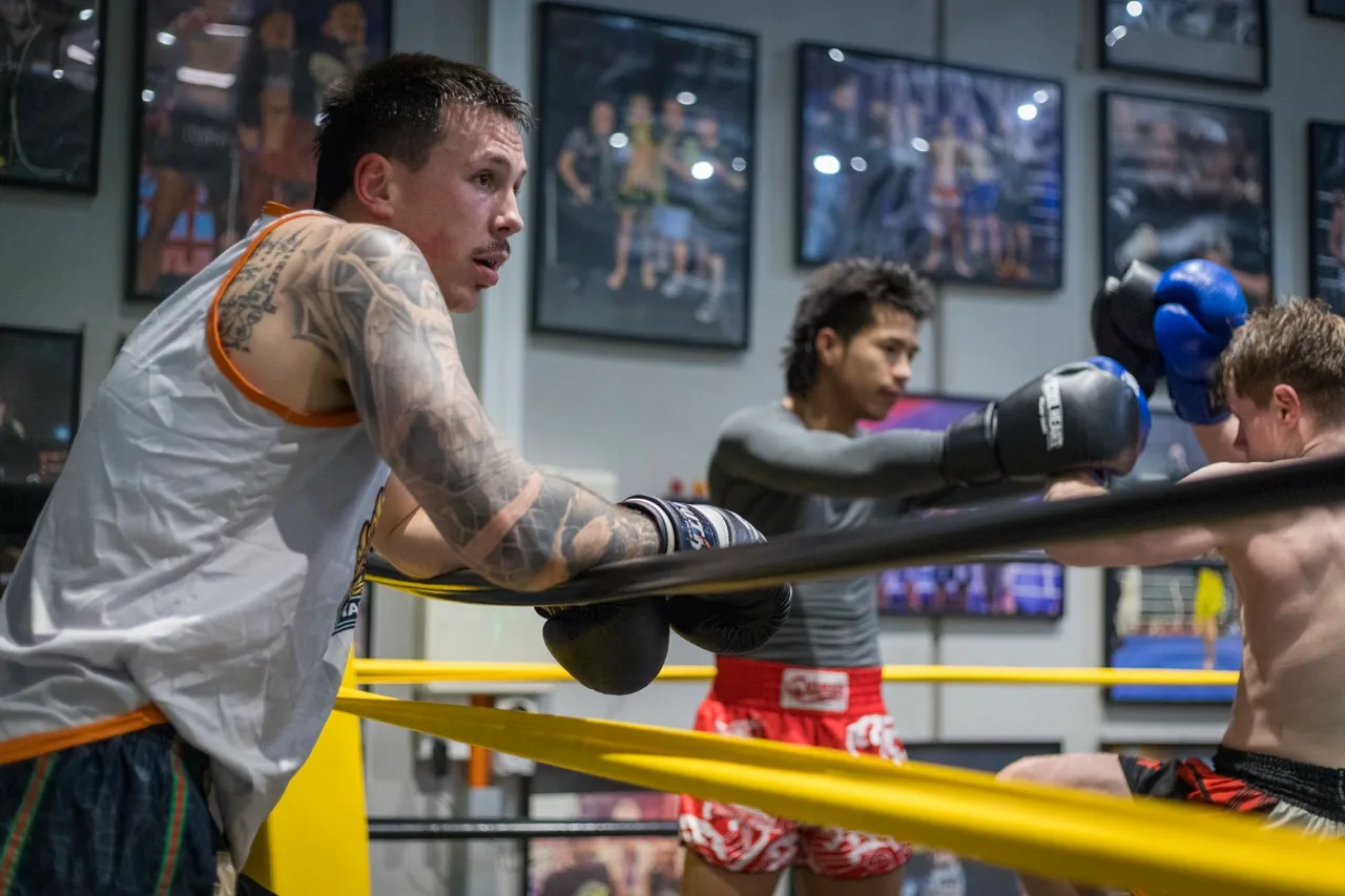 Cool Heart coach watching a fight team sparring round